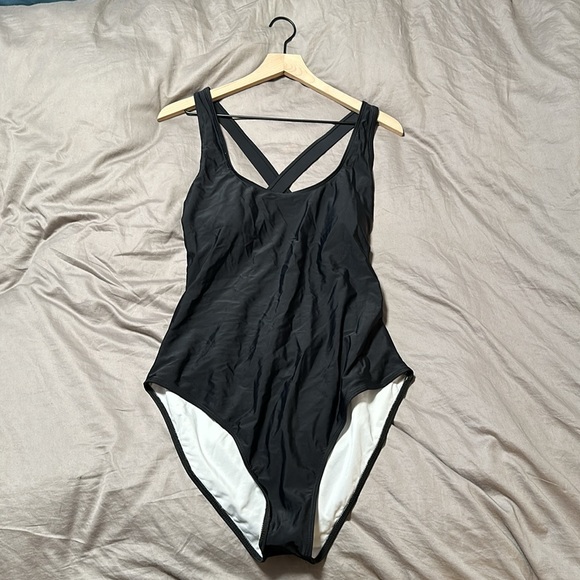 Never worn awesome swimsuit. It didn’t fit me, I have the size that did. 😊 - Picture 3 of 6